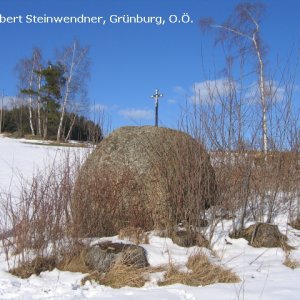 Wegkreuz auf Stein